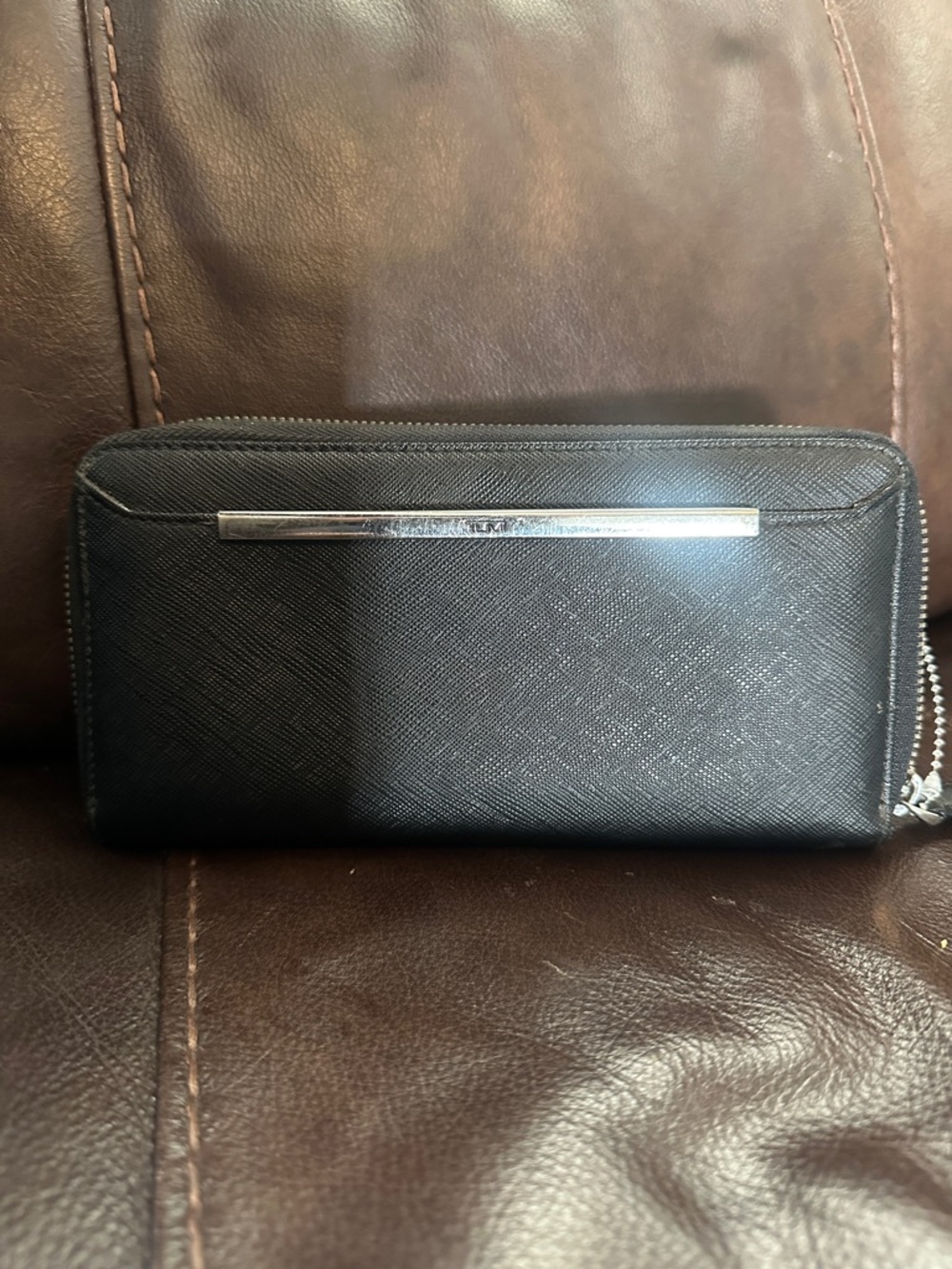 Tumi Black Zip-Around Saffiano Leather Wallet with Silver Accent